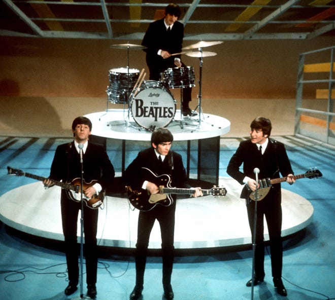 In this 1964 photo, The Beatles perform on the CBS "Ed Sullivan Show" in New York. File Photo/The Associated Press