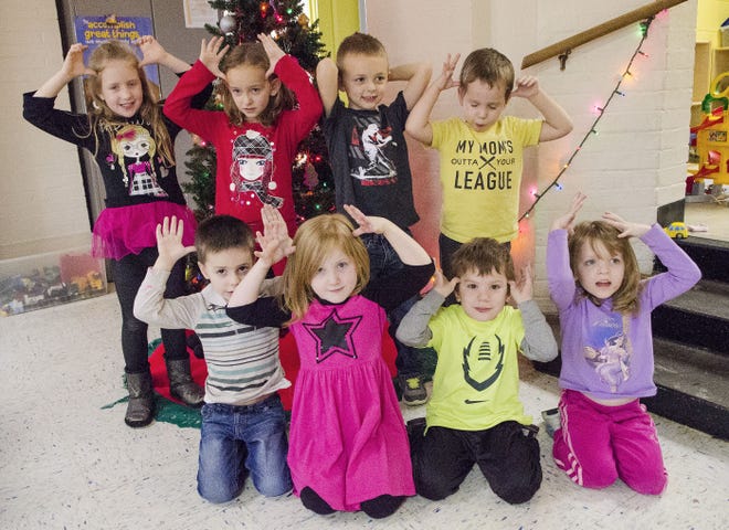 Front row, from left, Jake Malcom, 4, Lilly Pauley, 4, Nick Turner, 5, and Emma Emerson, 4; back row, from left, Chloe Quigley, 5, Clarissa Marker, 6, Grant Huston, 5, and Chase Coupe, 4, at Kiddie Korner Child Development Center.