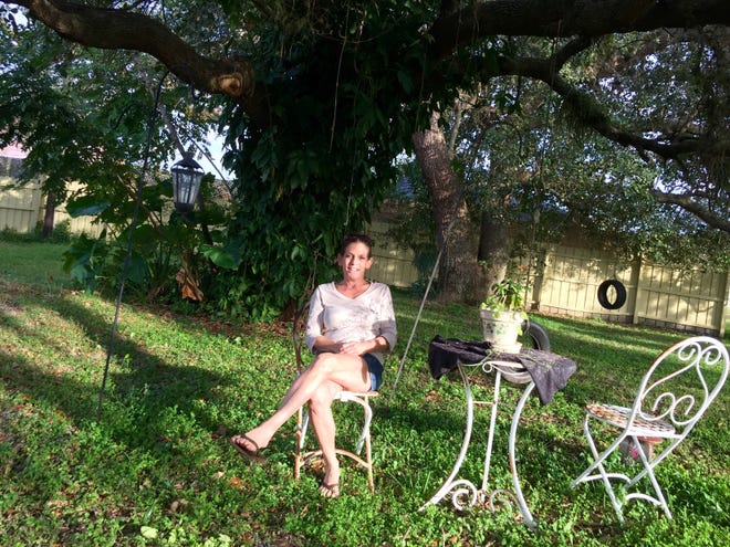 The United Way of Charlotte County helped Stacie Dalgleish hold on to her rental house in Port Charlotte, where she loves to relax beneath an oak tree in the backyard. STAFF PHOTO / THOMAS BECNEL
