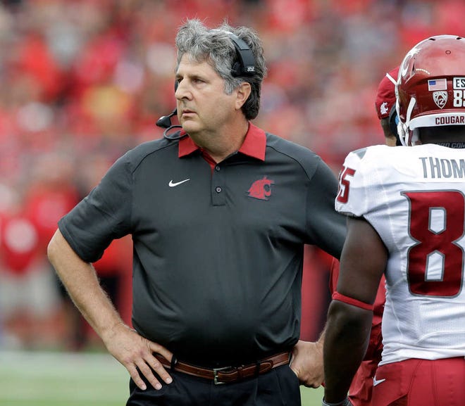 Washington State head coach Mike Leach has the Cougars as the nation's top-ranked passing team at 397 yards per game. The Cougars face Miami in the Sun Bowl on Saturday in El Paso.