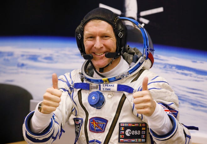 British astronaut Tim Peake, member of the main crew of the expedition to the International Space Station (ISS), gestures prior the launch of Soyuz TMA-19M space ship at the Russian leased Baikonur cosmodrome, Kazakhstan. Anyone can dial a wrong number, but it’s not often done from outer space. Peake tweeted an apology on Christmas Day from the International Space Station after calling a wrong number.