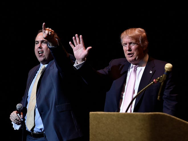 Real estate tycoon Donald Trump, on right, with Sarasota County GOP Chairman Joe Gruters, left, in this May 21 file photo. In October Gruters was named Trump's Florida campaign chairman. Trump spoke to a about 1,400 people at Van Wezel in May as part of his "Statesman of the Year" Award from the Republican Party of Sarasota. STAFF PHOTO / THOMAS BENDER