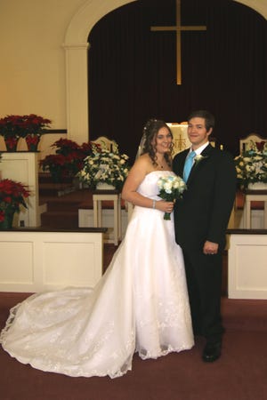 Mr. and Mrs. Justin B. Velvin are pictured following their marriage ceremony on Dec. 12, 2015, at Highland United Methodist Church in Colonial Heights.