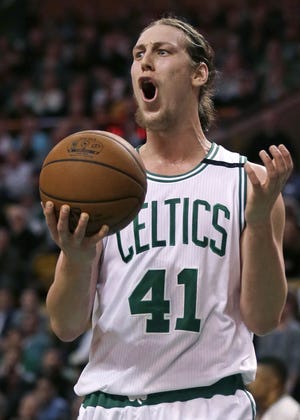 Boston Celtics center Kelly Olynyk has improved his 3-point shooting this season. The Associated Press