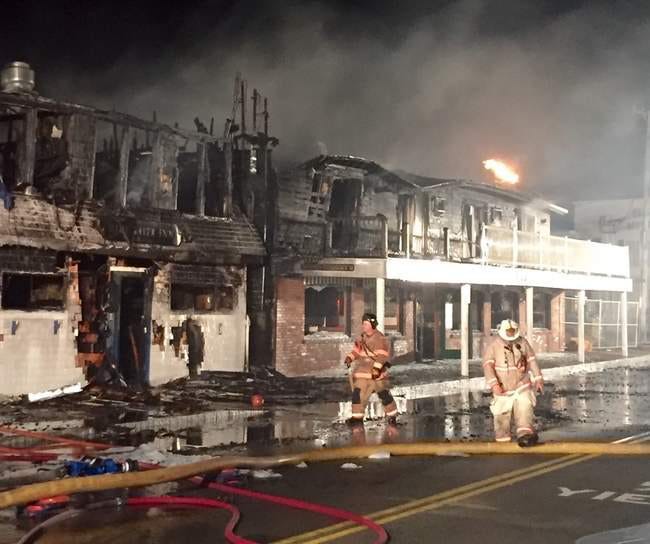 Fire destroyed popular Ogunquit landmarks the Blue Water Inn, Huckleberry’s Restaurant, and the Norseman Resort, located on Beach Street, in April.

File photo