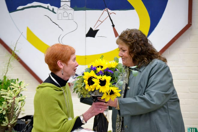 Courtesy photo

Club member honored



Pati Frew-Waters, Seacoast Family Promise director, presents Carol Chambers, a member of the Exeter Area Garden Club, with the Volunteer of the Year Award.