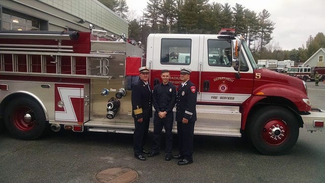 Maynard Fire Chief Anthony Stowers, Firefighter Michael Cisek and Capt. Sean Kiley at Cisek’s graduation at the Massachusetts Firefighting Academy. Courtesy Photo