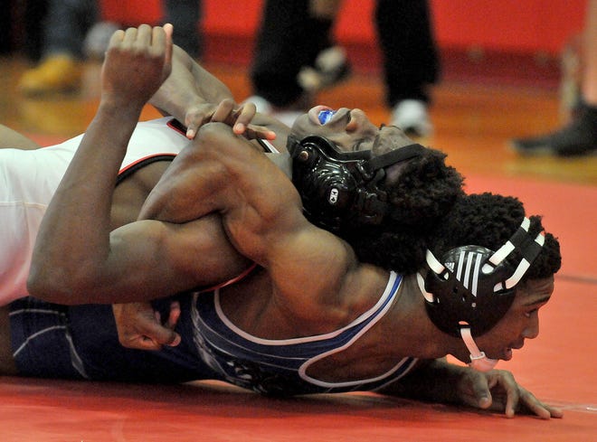 In the 145 lbs. finals in the Palmyra Holiday Tournament, on Wednesday, Dec. 30, 2015, BCIT-Westampton's Amir Harper (bottom) controls Cherry Hill East's Pillion Onubos. Harper won the bout with a score of 2-0.