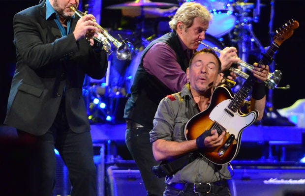 The horn section got up close as Bruce Springsteen and the E Street Band played "Johnny 99" during his 2014 concert at Consol Energy Center. Springsteen will kick off his tour in Pittsburgh on Jan. 16.