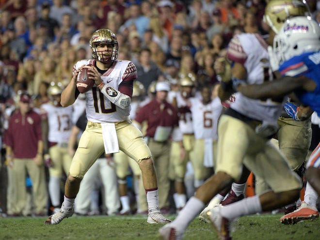 Florida State quarterback Sean Maguire (10) sets up to throw a pass during the first half of an NCAA college football game against Florida in Gainesville, Fla., Saturday, Nov. 28, 2015.