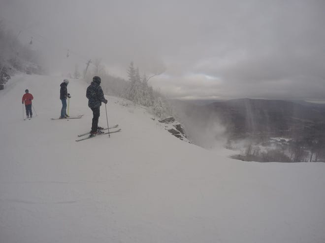 Skiers atop the Hellgate Trail on Monday at Hunter Mountain as snow guns blow. PHOTO COURTESY OF HUNTER MOUNTAIN
