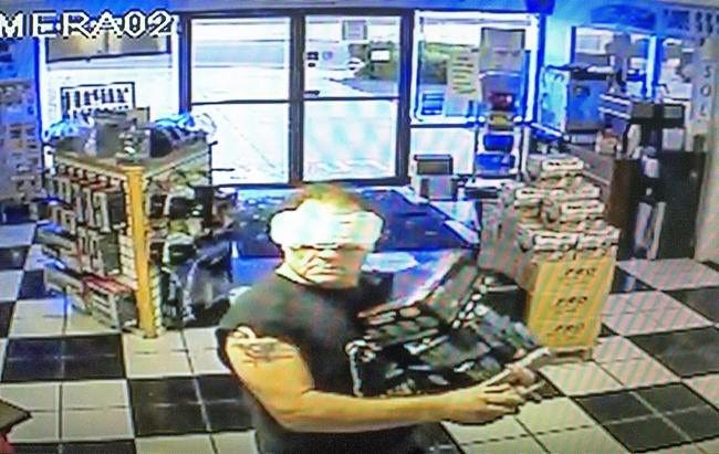 Authorities say this security footage shows a man burglarizing a store with a maxi pad stuck to his forehead. File photo, Daily Press