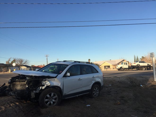 A white 2012 Kia Sorento is seen with front-end damage after a crash at Main Street and Timberlane Avenue in Hesperia on Wednesday afternoon. The crash left five people with minor injuries and four were taken to local hospitals, authorities said. Main Street was closed as authorities responded. Jose Huerta, Daily Press.