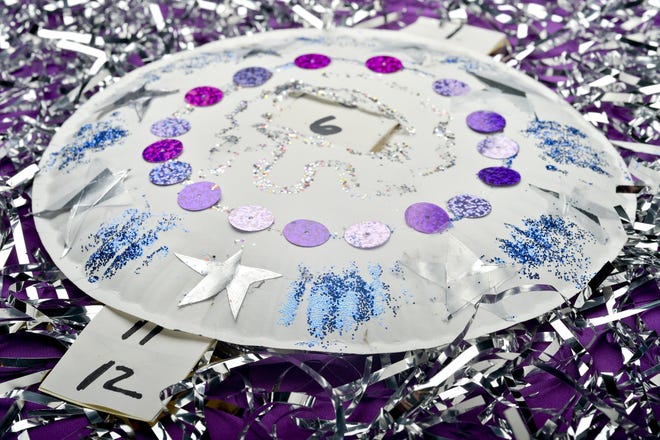A craft for New Year's Eve is shown Dec. 28 in the Erie Times-News studio. Every hour, the tab can be pulled from the top for a kid's countdown. SARAH CROSBY/