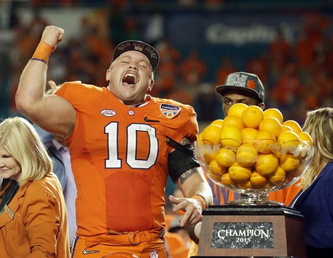 Clemson linebacker Ben Boulware (10) cheers during the award presentation after his team won the Orange Bowl NCAA college football semifinal playoff game against Oklahoma, Thursday, Dec. 31, 2015, in Miami Gardens, Fla. Clemson defeated Oklahoma 37-17. (AP Photo/Lynne Sladky)