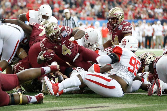 Florida State running back Dalvin Cook runs into the end zone for a touchdown against Houston during the second half of the Peach Bowl on Thursday in Atlanta. (AP Photo/John Bazemore)