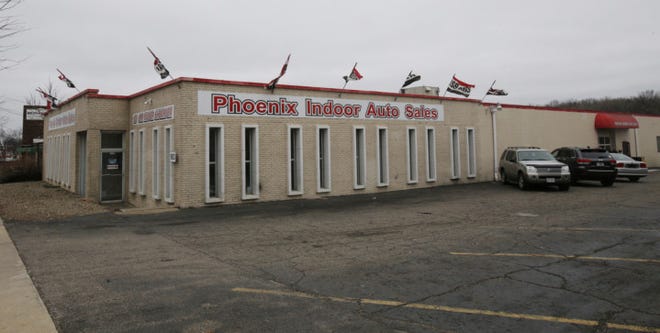 Phoenix Indoor Auto Sales on East Tallmadge Avenue in Akron. (Karen Schiely/Akron Beacon Journal)