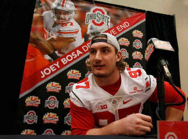 Ohio State defensive lineman Joey Bosa talks to the media during media day for the Fiesta Bowl NCAA college football game, Wednesday, Dec. 30, 2015, in Scottsdale, Ariz. Ohio State plays Notre Dame on New Year's Day. (AP Photo/Rick Scuteri)