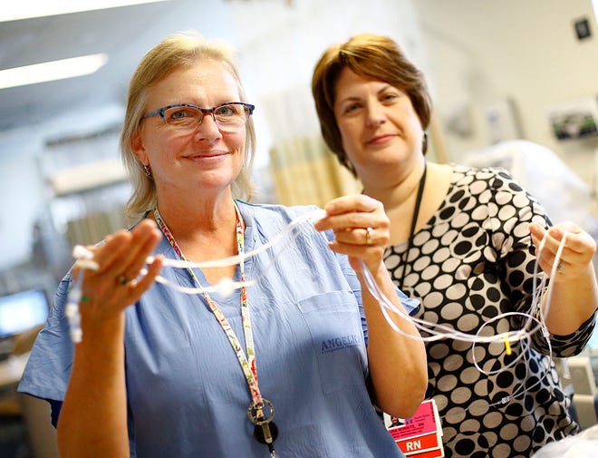Debra Gunning of Plymouth and Lisa Schultz of Abington, pediatric nurses in the neonatal intensive care unit at South Shore Hospital, worked with the Massachusetts Institute of Technology and a manufacturer to create better intravenous tubing assembly for newborns. The new unit has less connections, making it less vulnerable to bacteria. Monday, Dec. 14, 2015.