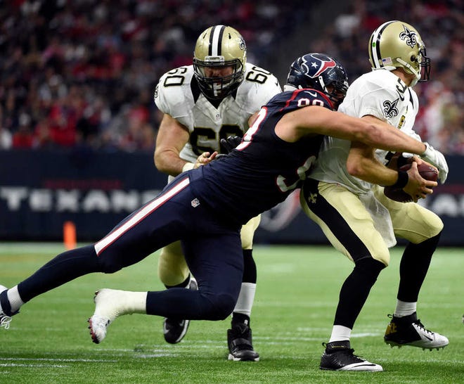 ADVANCE FOR WEEKEND EDITIONS, DEC. 5-6 - FILE - In this Nov. 29, 2015, file photo, Houston Texans defensive end J.J. Watt (99) sacks New Orleans Saints quarterback Drew Brees (9) during the third quarter of an NFL football game in Houston. Despite leading the league in sacks and helping the Houston Texans to a four-game winning streak that has them in the thick of the playoff hunt, Watt hardly being mentioned as a contender for MVP. Maybe the star defensive end should be mentioned with quarterbacks Cam Newton and Tom Brady as a candidate for the award. (AP Photo/Eric Christian Smith, File)