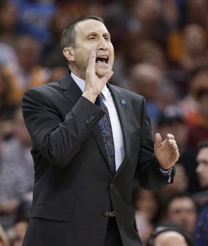 Cleveland Cavaliers head coach David Blatt yells to players in the first half of a game against the Orlando Magic, Saturday in Cleveland. The Cavaliers won 104-79. (AP Photo/Tony Dejak)