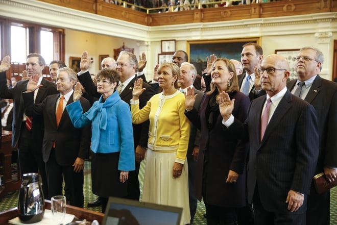 State senators take the oath of office on the first day of the Texas Legislature on Jan. 13, 2015.
