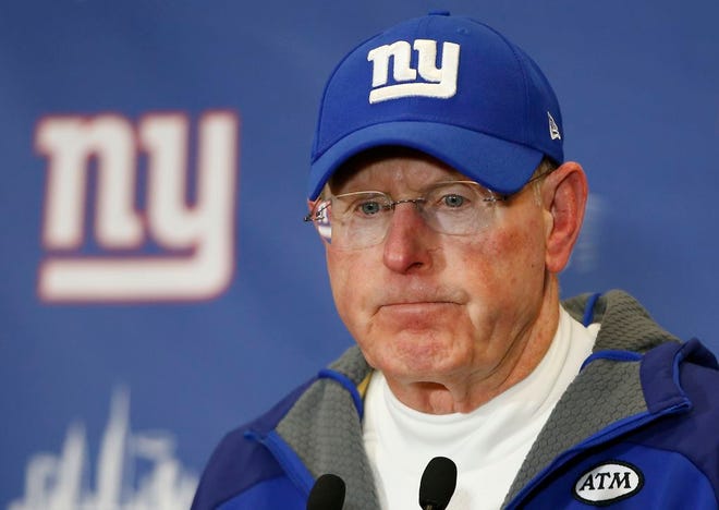 FILE - In this jan. 3, 2016, file photo, New York Giants head coach Tom Coughlin answers questions during a news conference after the Giants lost 35-30 to the Philadelphia Eagles in an NFL football game, in East Rutherford, N.J. Tom Coughlin, who returned the Giants to NFL prominence by winning two Super Bowls, resigned Monday, Jan. 4, 2016, after missing the playoffs for the fourth consecutive year. (AP Photo/Kathy Willens, File)