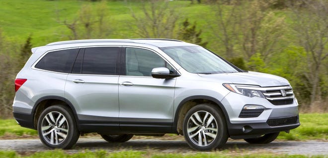 The clean-sheet 2016 Honda Pilot manages to be bigger yet lighter, more powerful yet more fuel-stingy than its predecessor. A base Pilot LX with FWD starts at $30,875; a fully equipped Pilot Elite AWD lists for $47,300. (Honda)