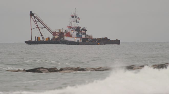 This dredge, which arrived Thursday, began pumping sand from the Cape Cod Canal onto Town Neck Beach on Monday. Cape Cod Times file