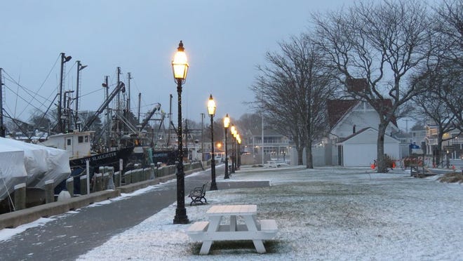 A dusting of snow at Hyannis Harbor on Tuesday morning.