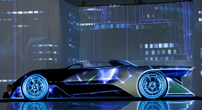 The FFZero1 by Faraday Future is displayed at CES Unveiled, a media preview event for CES International Monday, Jan. 4, 2016, in Las Vegas. The high performance electric concept car was unveiled during a news conference by Faraday Future. (AP Photo/Gregory Bull)