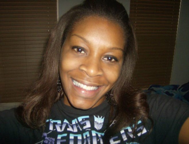 In this undated photo provided by the Bland family, Sandra Bland poses for a photo. A grand jury indicted Trooper Brian Encinia on Wednesday, Jan. 6, 2016, with the misdemeanor charge. Encinia has been on desk duty since Bland was found dead in her cell in July. Her death was ruled a suicide. (Courtesy of Bland family via AP, File)