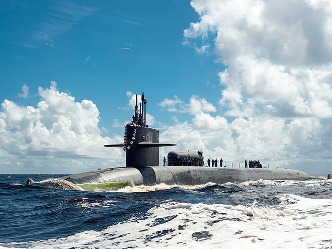 A commanding officer of the USS Georgia missile submarine at Kings Bay, Georgia, was relieved of duty Monday after an investigation into a November collision and grounding.