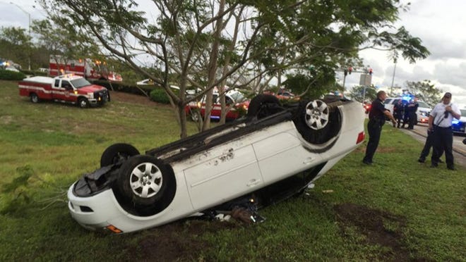 The car came to rest at a tree near the southbound exit ramp from Interstate 95 at Atlantic Avenue in Delray Beach. (Contributed)
