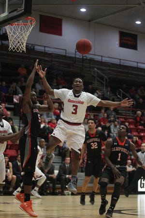LaQuincy Rideau, 3, looses possession of the basketball for GWU on a drive into the teeth of the Campbell defense Wednesday night at Porter Arena. GWU would beat the Camels, 71-68.
