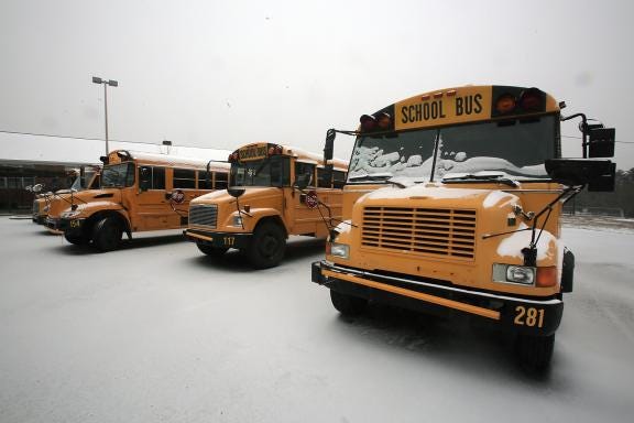 Cleveland County school buses park at Casar Elementary School during a winter storm in 2014. Superintendent Stephen Fisher said typically 172 buses are running for 29 school facilities, and once the weather begins to turn, the transportation, maintenance and custodial staff will arrive early to make sure each bus will get through its route smoothly. (Star file photo)