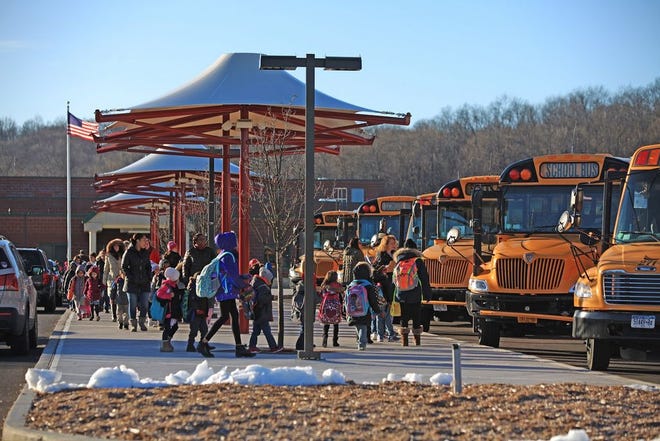 Students leave Maple Hill Elementary in the Town of Wallkill on Wednesday afternoon.
