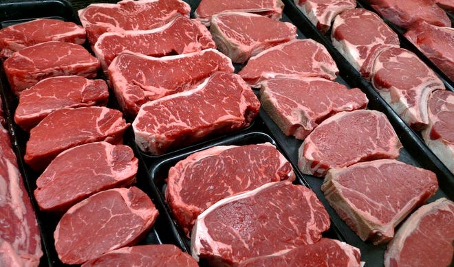 Steaks and other beef products are displayed for sale at a grocery store in McLean, Va. Americans may not have to cut back on eggs and salt as much as they once thought, according to the Obama administration's new dietary guideline. (AP Photo/J. Scott Applewhite, File)