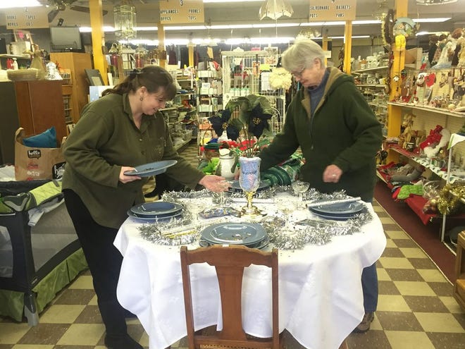 Store manager Dianna Starling and volunteer Joyce Strickland work on a display at the Snip’N Save thrift store in Mount Shasta. The store provides funding for the SNIP Program, which helps low income Siskiyou County residents afford to have their dogs and cats spayed and neutered. They are looking for more volunteers and donations to keep the store vibrant.
