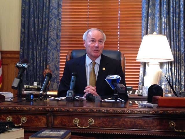 JOHN LYON • ARKANSAS NEWS BUREAU
Gov. Asa Hutchinson talks to reporters in his office at the state Capitol on Wednesday, Jan. 6, 2015.