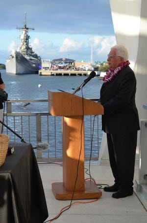This photo speaks of the recent Dec. 7 ceremony at Pearl Harbor with The Rev. Robert Lawrence speaking at the site of the U.S.S. Arizona Memorial, very much aware of the surprise attack by the Japanese on that morning 74 years ago. To Lawrence's right is the U.S.S. Missouri as a symbol of peace upon whose decks the treaty to end WWII was signed. The premise of that treaty between Japan and the Allies acknowledges a forgiveness resulting in a reconciliation that responds positively to God's gift of that “peace I give unto you,” Lawrence said.