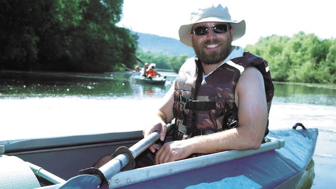 Gabriel Riggle takes a break from his duties with the Peace Corps to kayak on the Nistru River in Moldova.