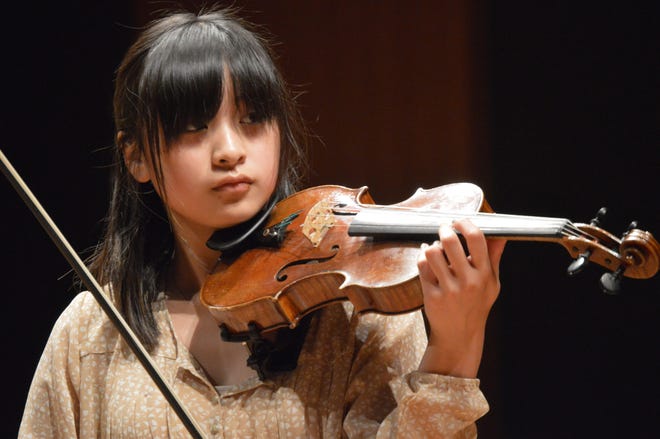Natalie Bloss, violinist, performs at the Norbert Mueller Concerto Competition on Saturday, Jan. 9, at the Jack H. Miller Center for Musical Arts. Justine McGuire/Sentinel staff