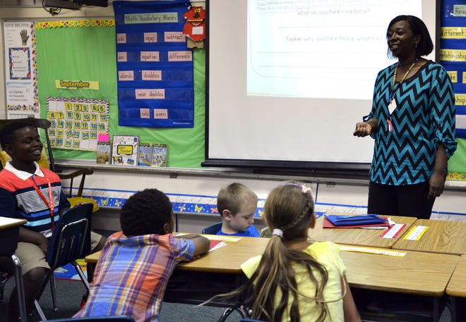 Second-grade teacher Tushena Scott instructs her students last September at Eustis Elementary School. The Florida Legislature is considering a bill that would make changes to a complex state formula helping Lake County, which is next to last in the state in per-pupil funding.