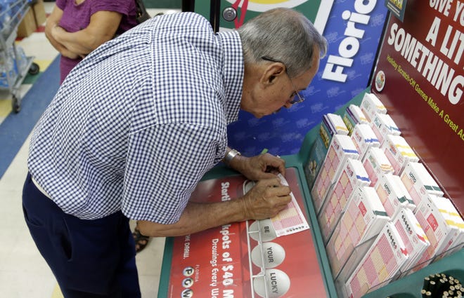 No Powerball winner. Jackpot expecte to climb to $1.3 billion by next Wednesday's drawing. (AP Photo/Lynne Sladky)