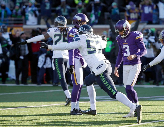 Minnesota Vikings kicker Blair Walsh reacts after missing a field goal during the second half of a wild-card playoff game against the Seattle Seahawks on Sunday in Minneapolis. The Seahawks won 10-9. (AP Photo/Jim Mone)