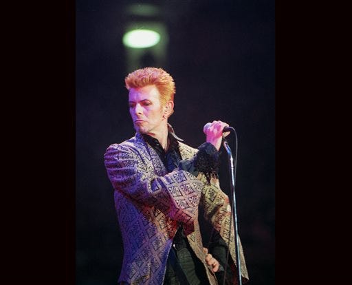 FILE - In this Jan. 9, 1997, file photo, David Bowie performs during a concert celebrating his 50th birthday, at Madison Square Garden in New York. Bowie, the innovative and iconic singer whose illustrious career lasted five decades, died Monday, Jan. 11, 2016, after battling cancer for 18 months. He was 69.