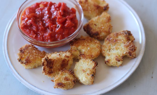 Baked instead of fried, these cauliflower cutlets are low in fat and high in flavor. Serve them with a marinara dipping sauce.



AP Photo/Matthew Mead