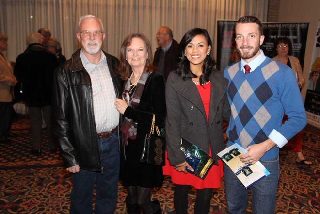 The Thomas family - Truman, from left, Cindy, Stephanie and Tyler - attends an evening of Christmas music by Mannheim Steamroller at Amarillo Civic Center Complex.