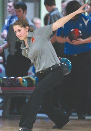 Tecumseh senior Brianna Weimer bowls during Monday’s match against Adrian at the Lenawee Recreation Bowling Center. Weimer helped the Indians to a win against their SEC rival by rolling a 149, 201 and winning two matches on the day.